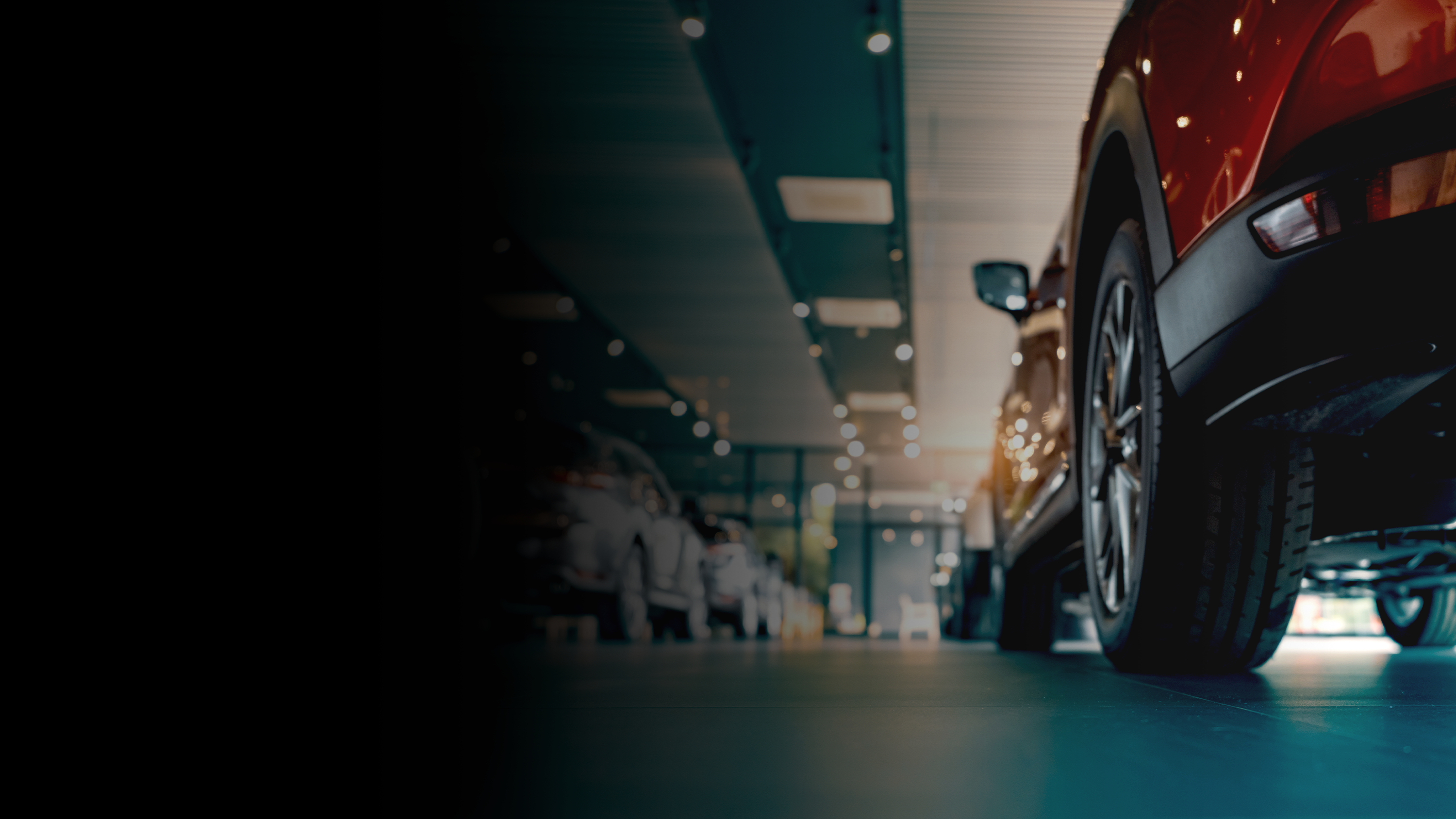 Cars in an automotive dealership.