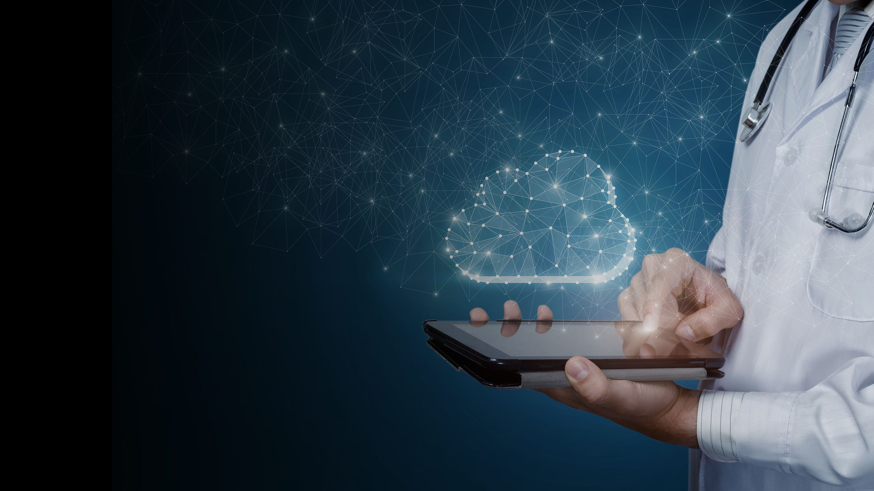 Healthcare professional working on a tablet with a cloud icon.