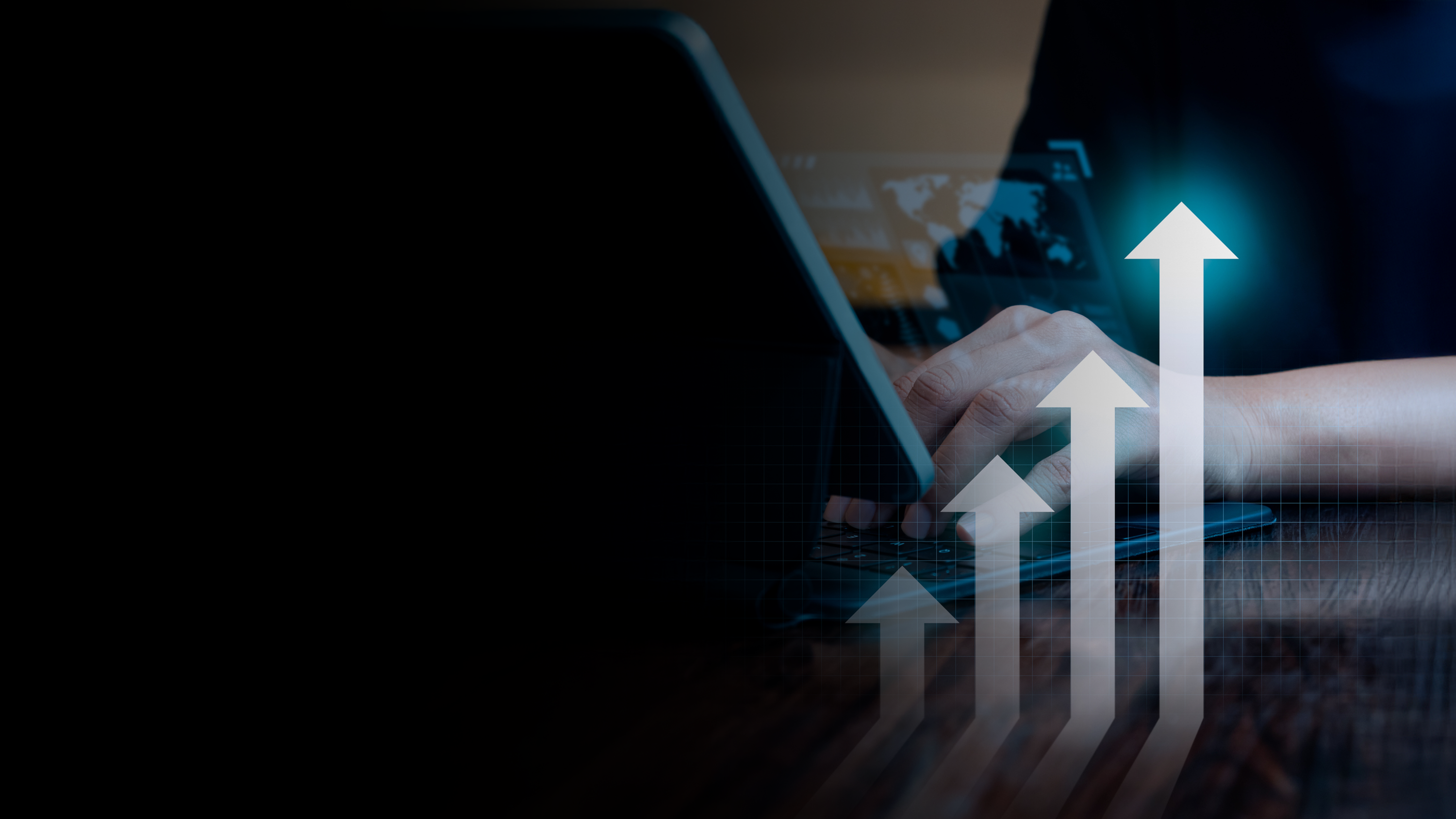 Computer with map and increasing chart.