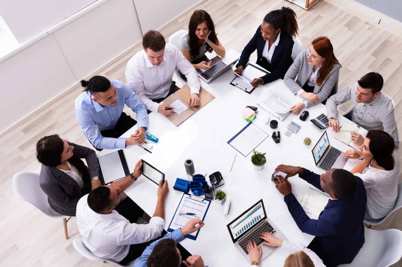 A group businessmen and woman having a meeting. 