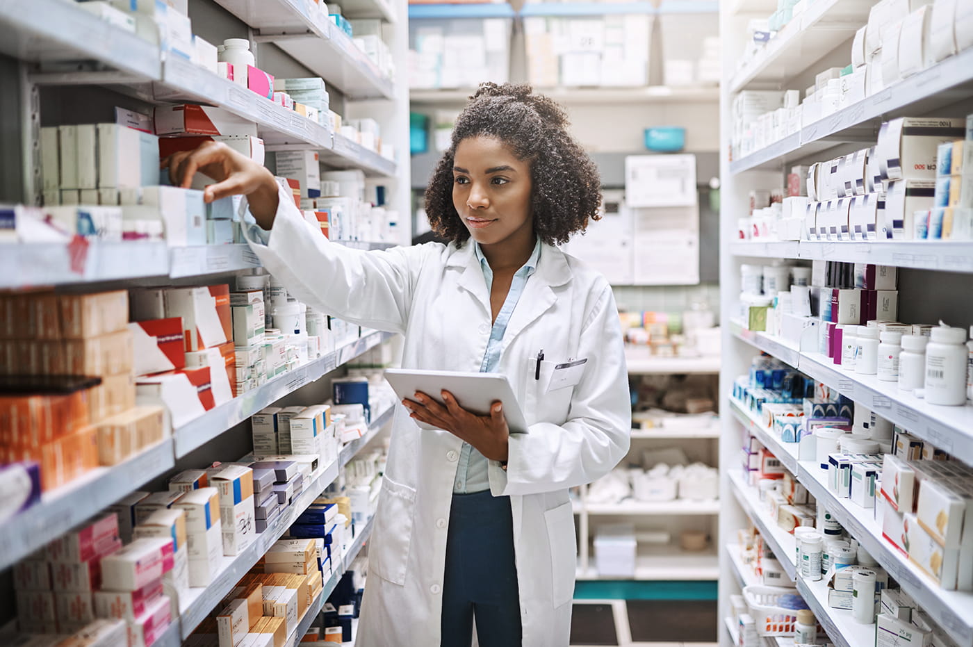 Healthcare worker picking out a Prescription