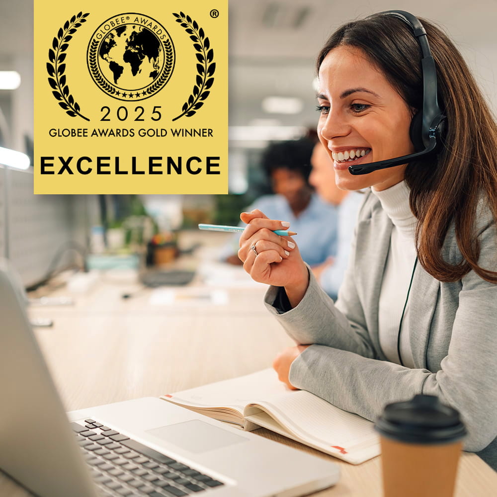2025 award with woman on call on her computer wearing a headset