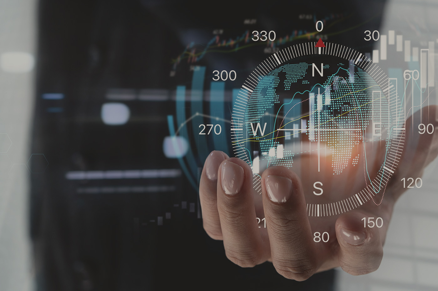 A man holding a digital compass