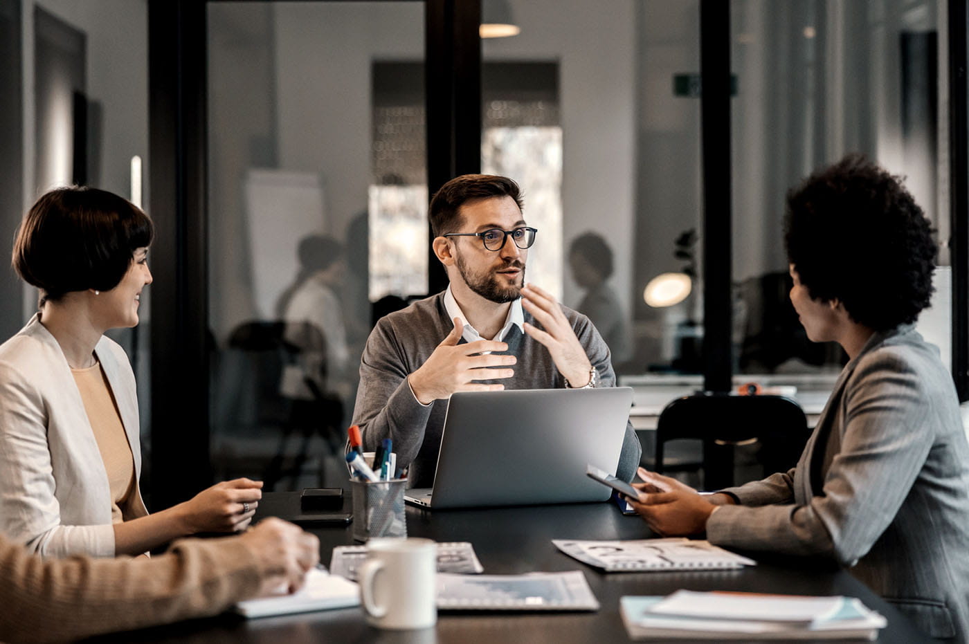 Colleagues sitting in a meeting.