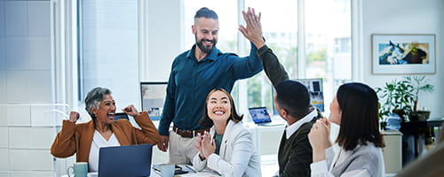 A team celebrating accomplishments