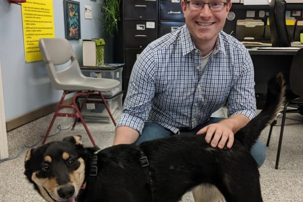 Kurt Heslop, lead technical consultant, at Perficient, posing at the Hood River Adopt A Dog Shelter in Oregon