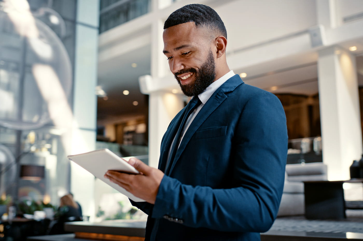 A banker using a tablet.