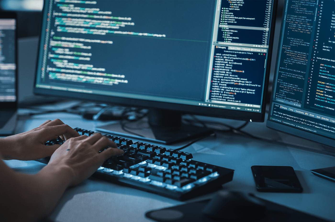 Person typing on a keyboard